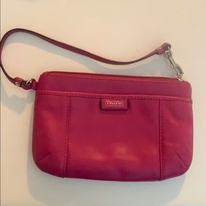 pink COACH leather wristlet